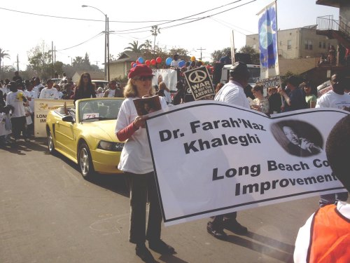 CIL's banner carried by Colleen Bentley-Adler, Board Treasurer - 20 Feb 2004